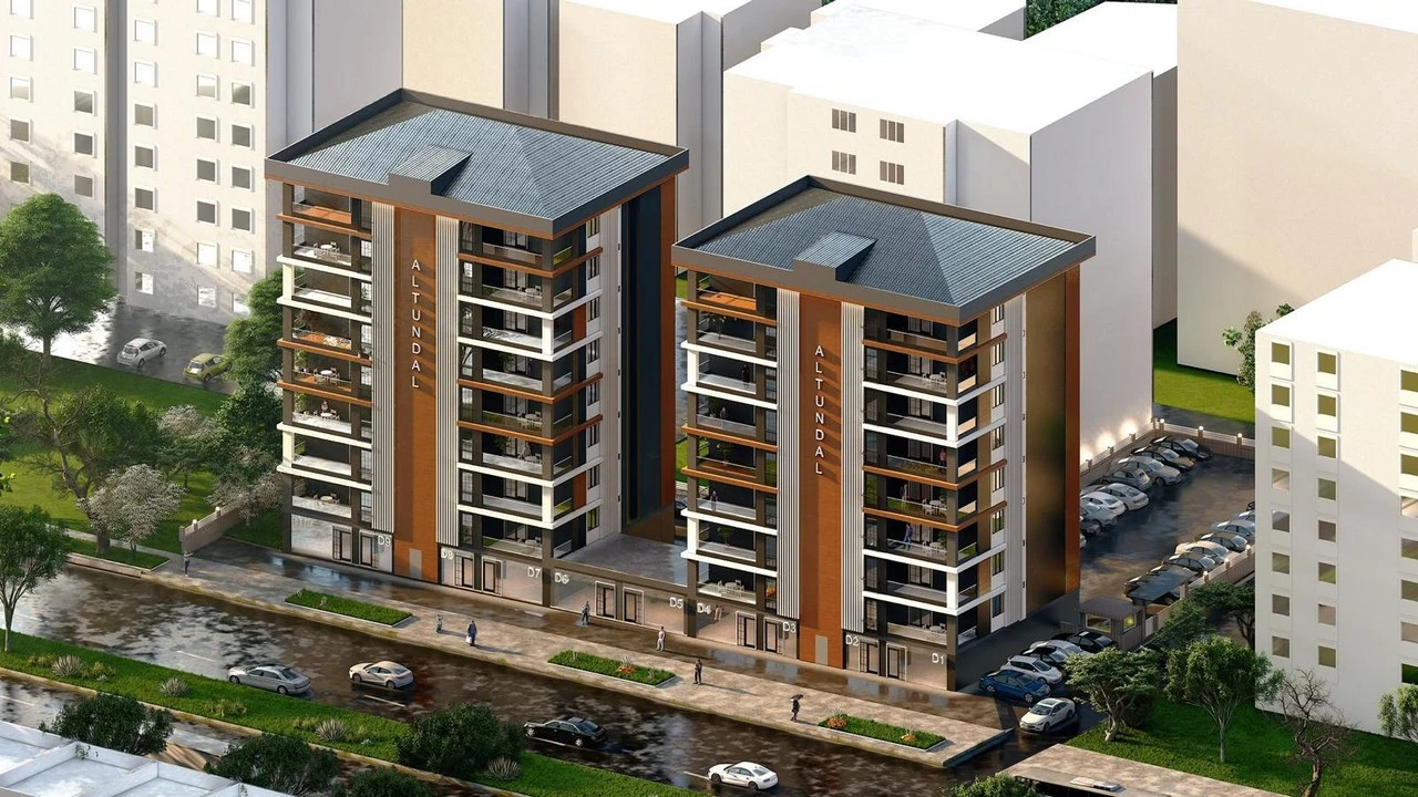Yenişehir Apartman Sitesi — İki blok ve açık otoparkın kuşbakışı perspektifi